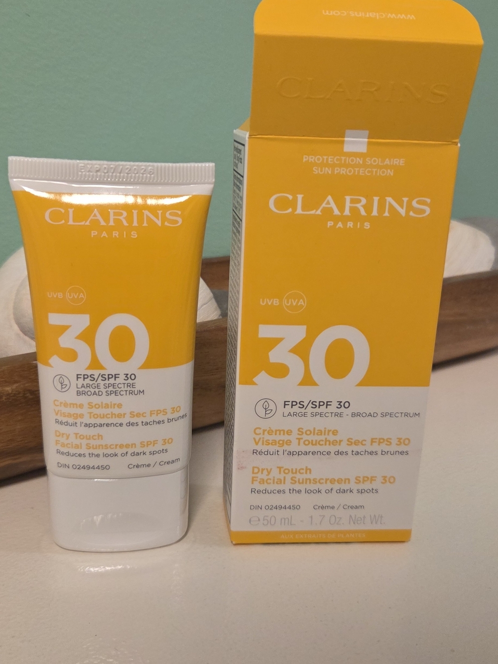 Clarins Yellow SPF 30 Dry Touch Facial Sunscreen Tube and Box